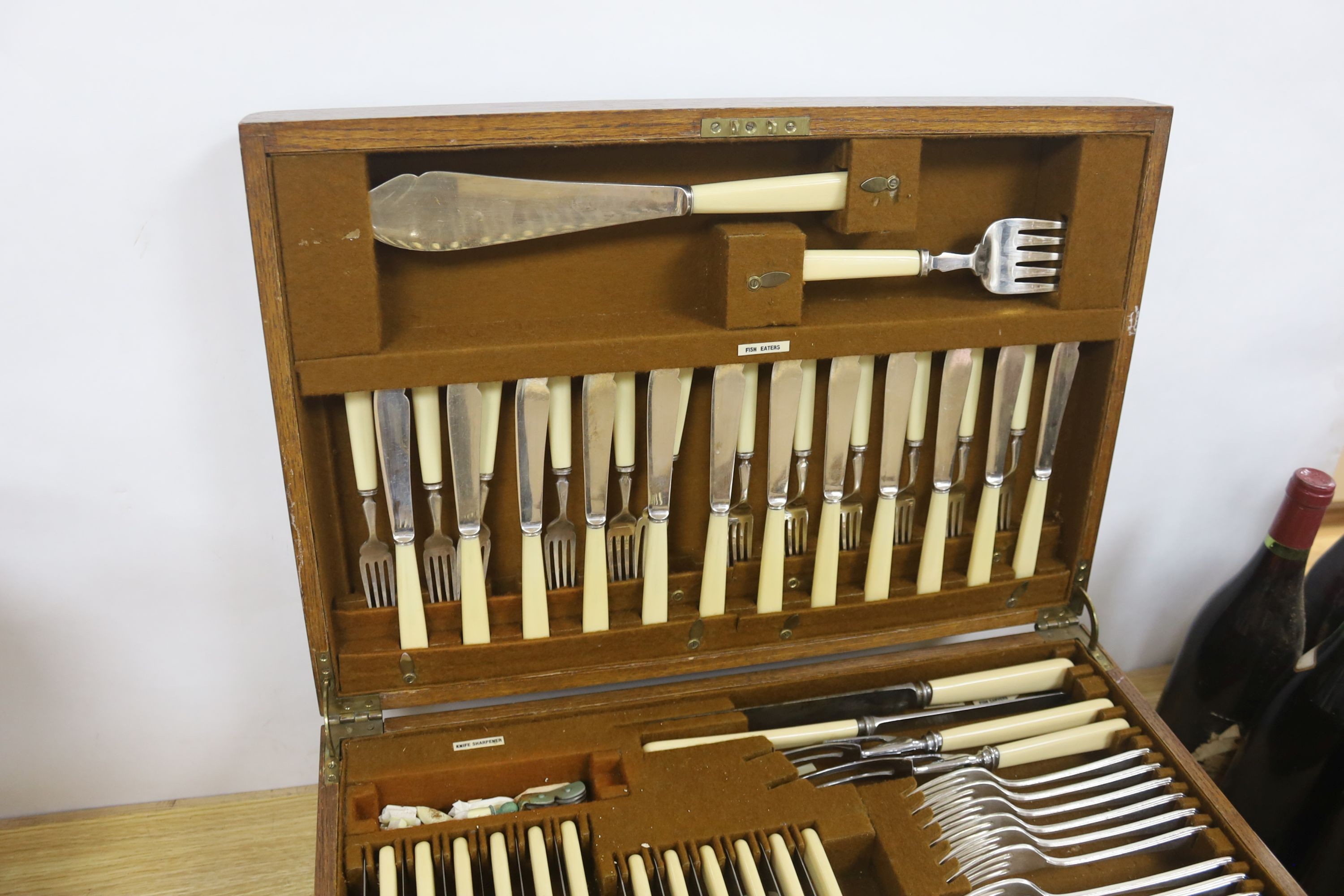 A Mappin and Webb oak cased canteen of plated flatware (113 pieces)
